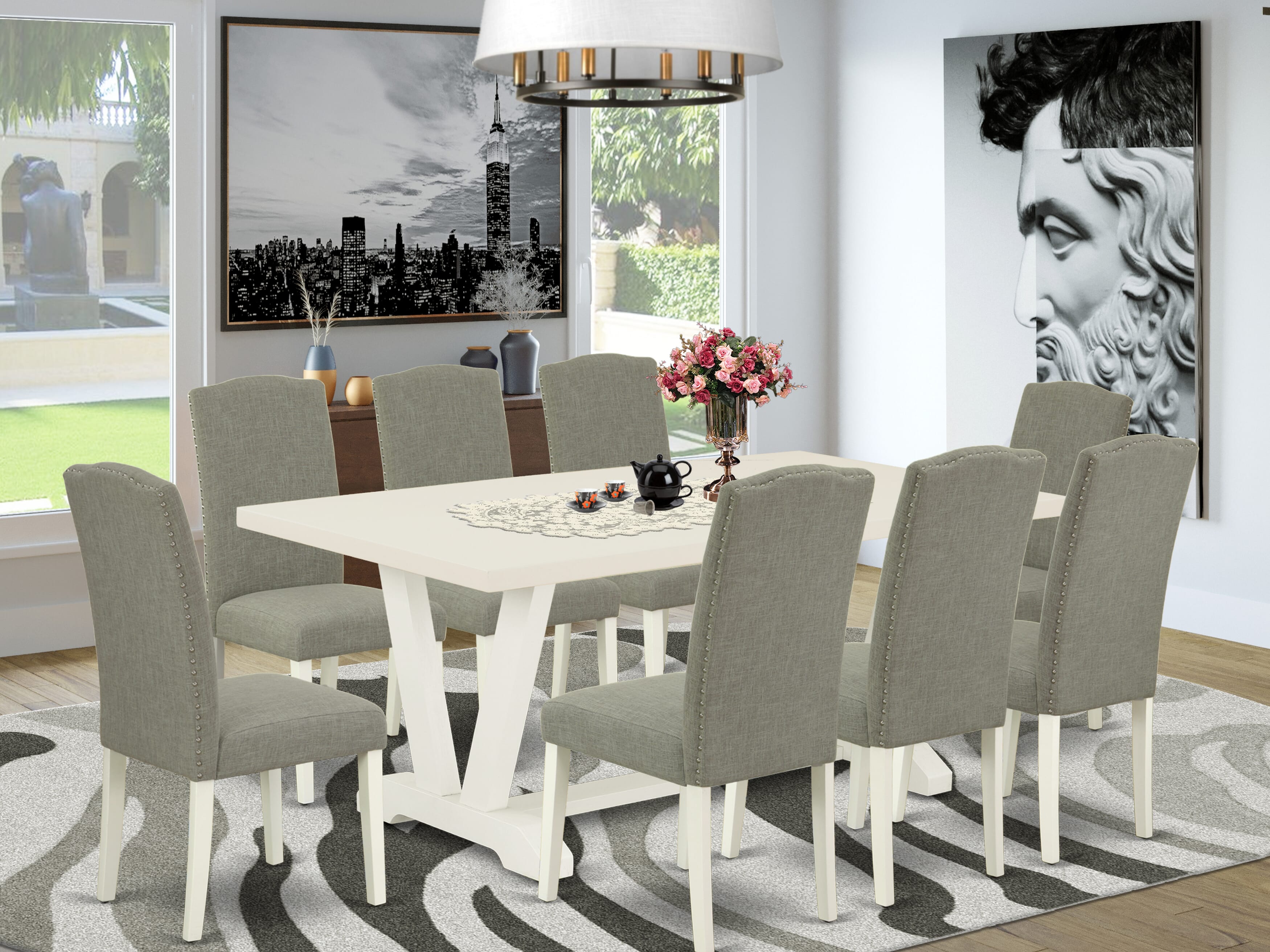Juego de comedor de 9 piezas East West Furniture V027EN206-9. Incluye una mesa de cocina rectangular con patas en V y 8 sillas tapizadas en tela de lino shitake oscuro.