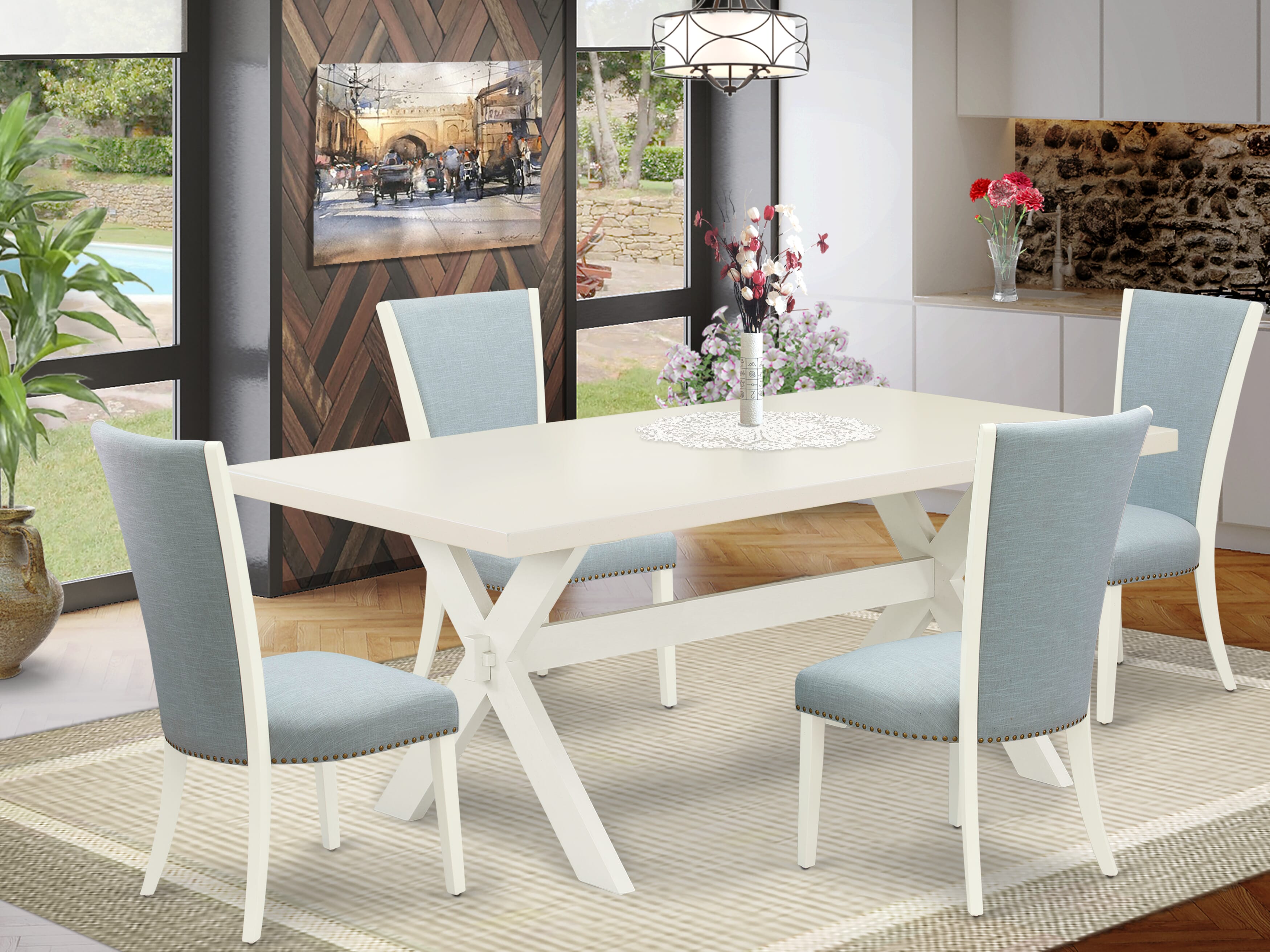 Juego de mesa y sillas de cocina de 5 piezas East West Furniture X027VE215-5. Incluye una mesa de comedor rectangular con patas en forma de X y 4 sillas Parsons de tela de lino azul bebé.