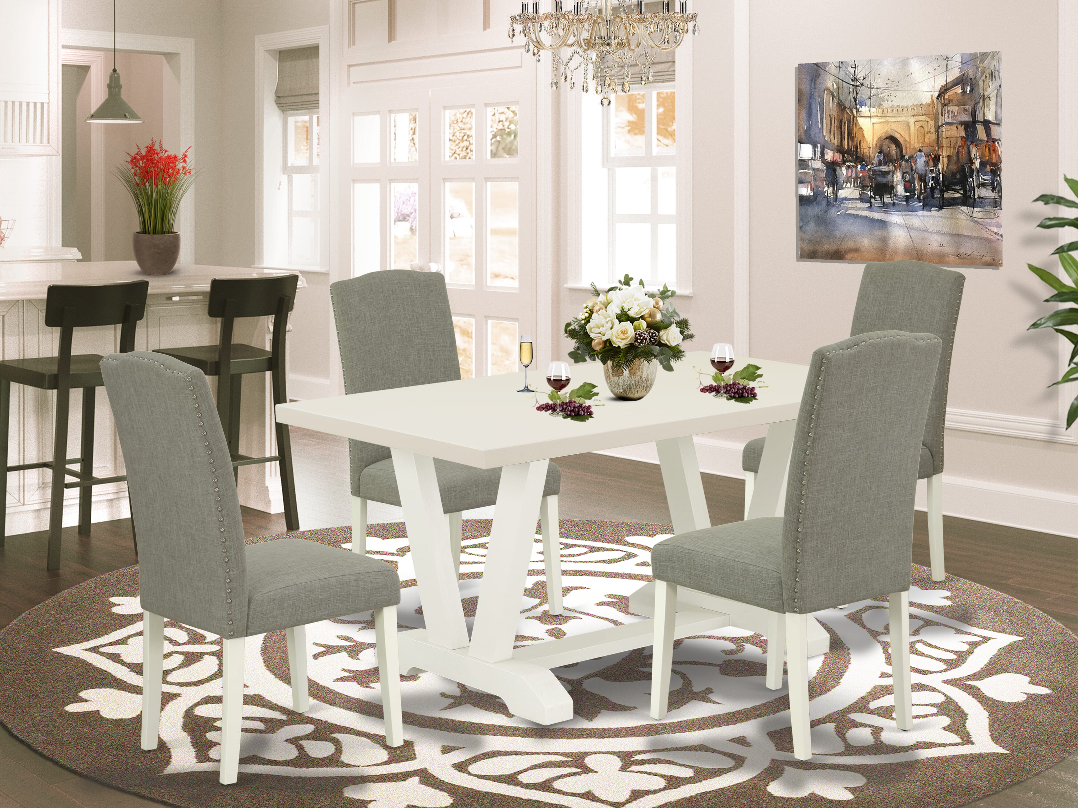 Juego de comedor de 5 piezas East West Furniture. Incluye 4 sillas de comedor con asiento tapizado con clavos, elegante respaldo y mesa de comedor rectangular con cubierta de lino blanco. Acabado en lino blanco.