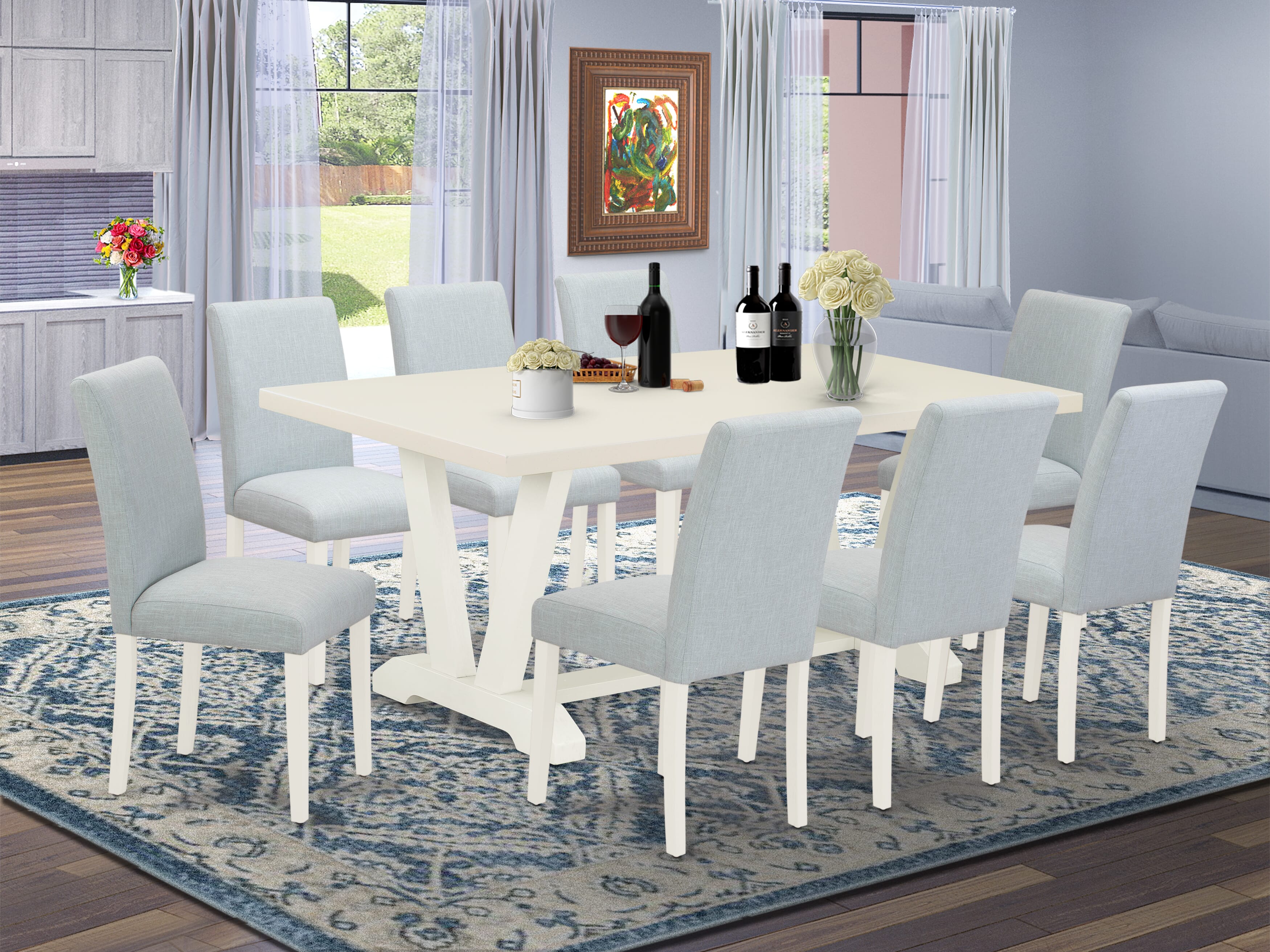 Juego de mesa de comedor de 9 piezas East West Furniture V027AB015-9. Incluye una mesa de comedor rectangular con patas en V y 8 sillas tapizadas en tela de lino azul bebé.