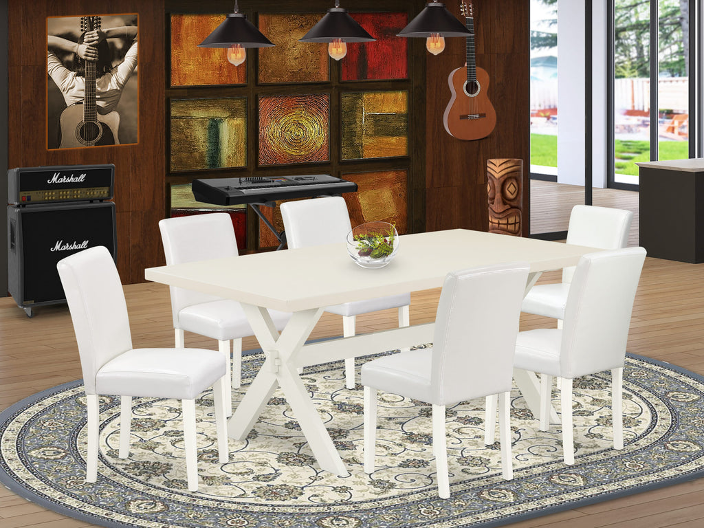 Juego de comedor de 7 piezas East West Furniture X027AB264-7 compuesto por una mesa de comedor rectangular con patas en forma de X y 6 sillas Parson tapizadas en piel sintética blanca.