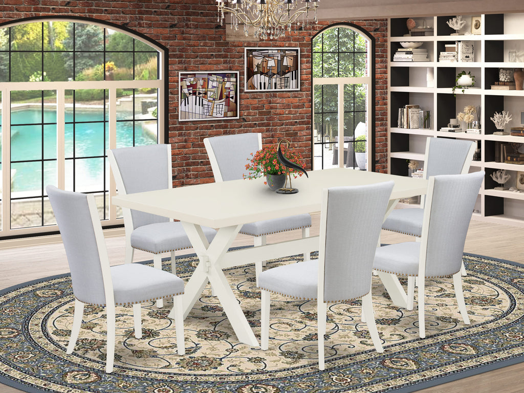 Juego de comedor de 7 piezas East West Furniture X027VE005-7 compuesto por una mesa de comedor rectangular con patas en forma de X y 6 sillas Parson tapizadas en tela de lino gris.