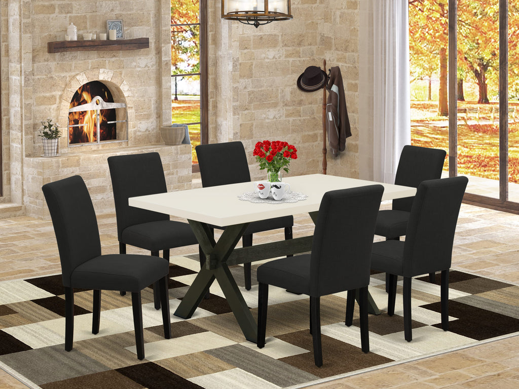 Juego de comedor East West Furniture X626AB624-7 de 7 piezas compuesto por una mesa de comedor rectangular con patas en forma de X y 6 sillas Parson tapizadas en tela de lino de color negro.