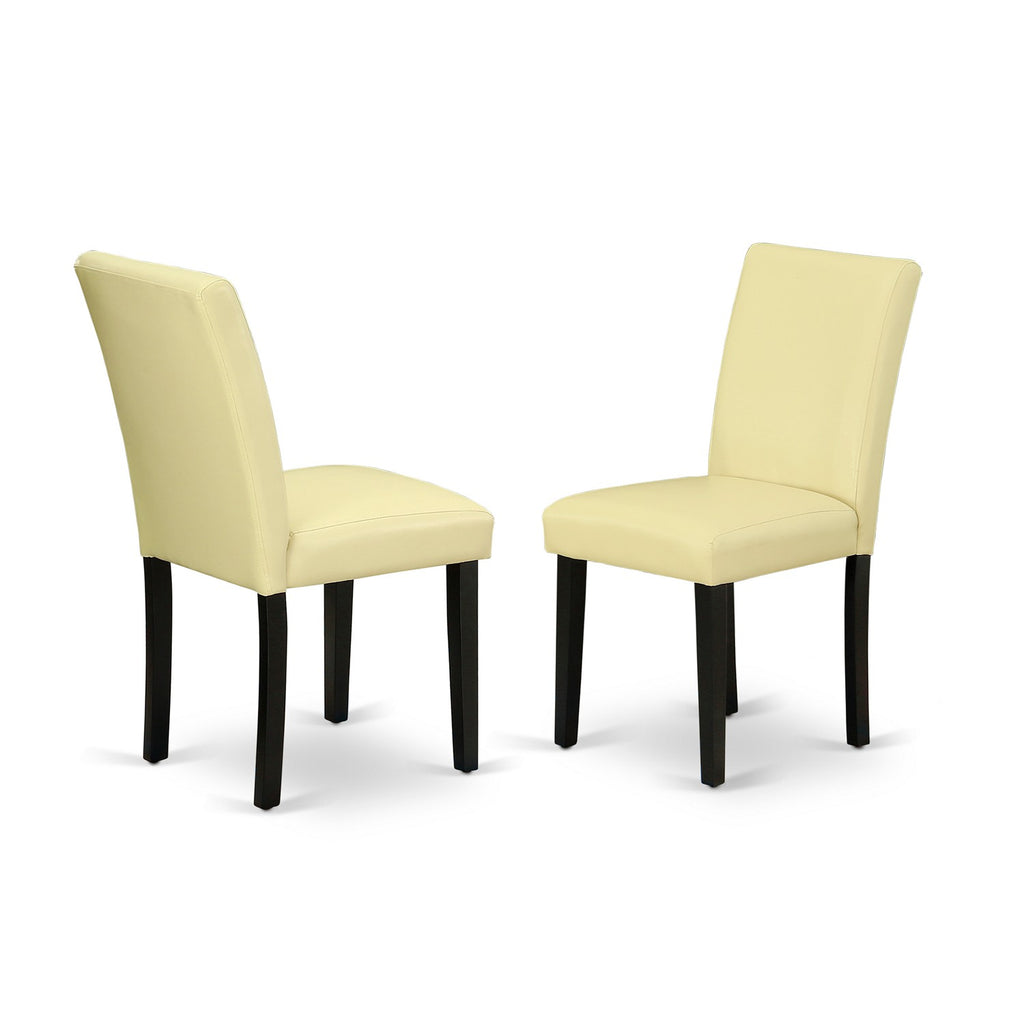 East West Furniture ABP1T73 Abbott Parson Dining Room Chairs - Eggnog Faux Leather Upholstered Chairs, Set of 2, Black