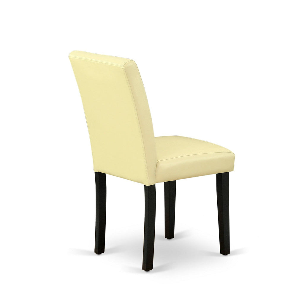 El juego de comedor de 5 piezas East West Furniture LGAB5-BLK-73 incluye una mesa de comedor rectangular con diseño de hojas de mariposa y 4 sillas Parson tapizadas en piel sintética color ponche de huevo.