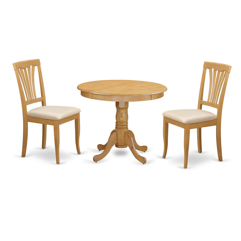 Juego de mesa de comedor de 3 piezas ANAV3-OAK-C de East West Furniture. Contiene una mesa redonda de madera con pedestal y 2 sillas de comedor de cocina de tela de lino.
