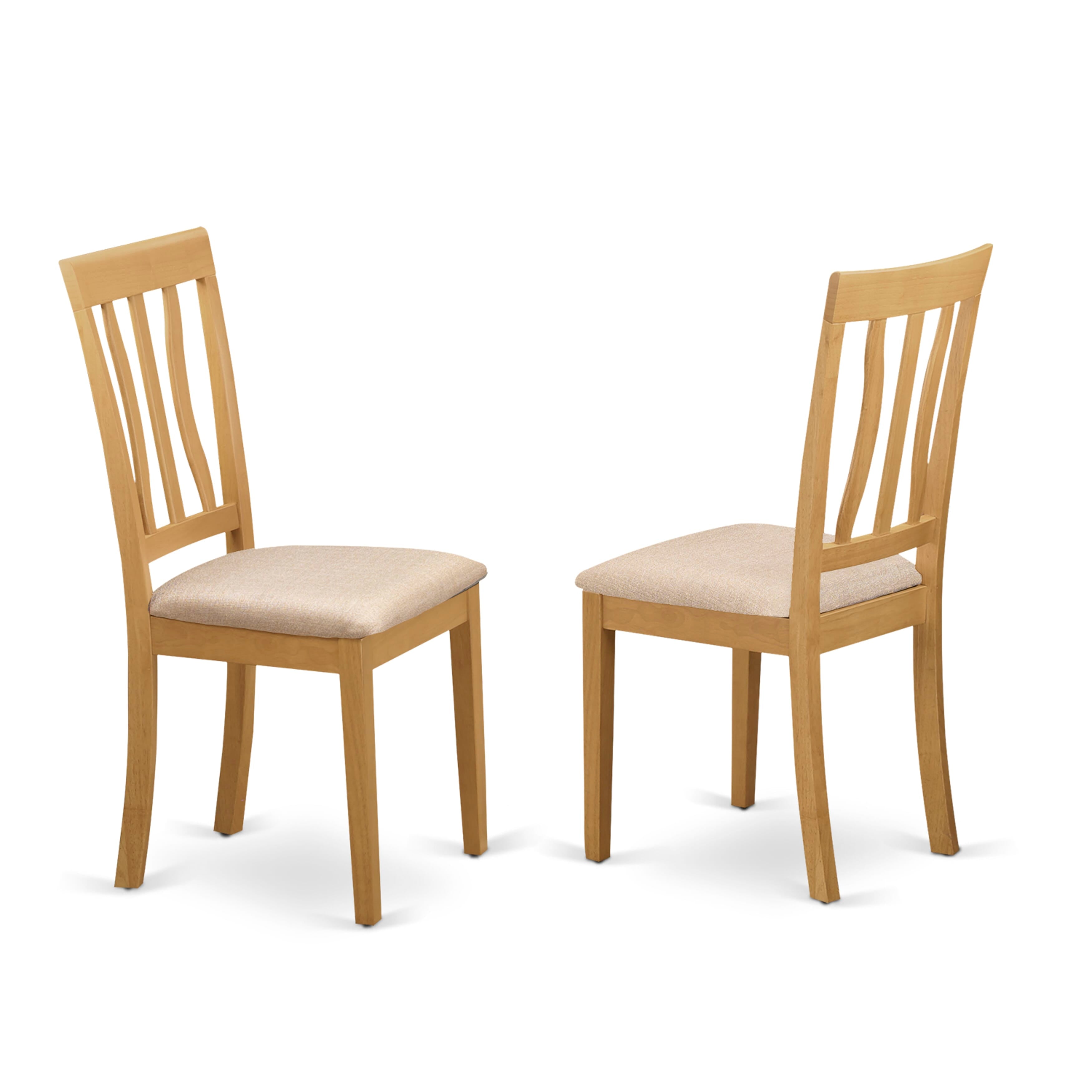 El juego de mesa de comedor de 5 piezas NDAN5-OAK-C de East West Furniture incluye una mesa de cocina rectangular con alas abatibles y 4 sillas de comedor tapizadas en tela de lino.