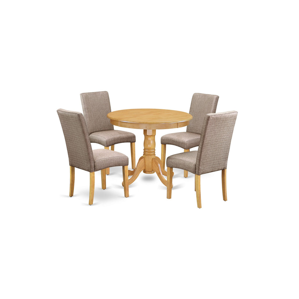 Juego de comedor de 5 piezas East West Furniture ANDR5-OAK-16. Incluye una mesa de cocina redonda con pedestal y 4 sillas Parson tapizadas en tela de lino color caqui oscuro.