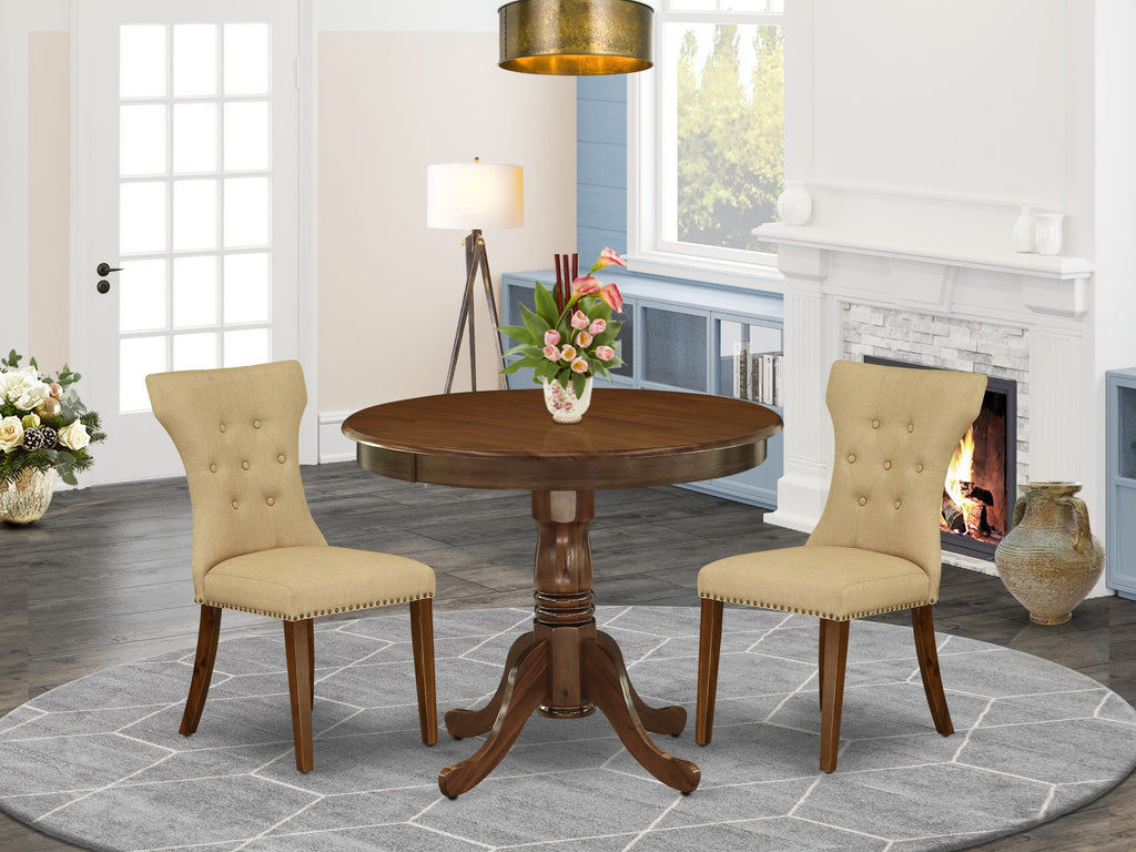 Juego de comedor de 3 piezas ANGA3-AWA-03 de East West Furniture. Contiene una mesa de comedor redonda con pedestal y 2 sillas tapizadas.