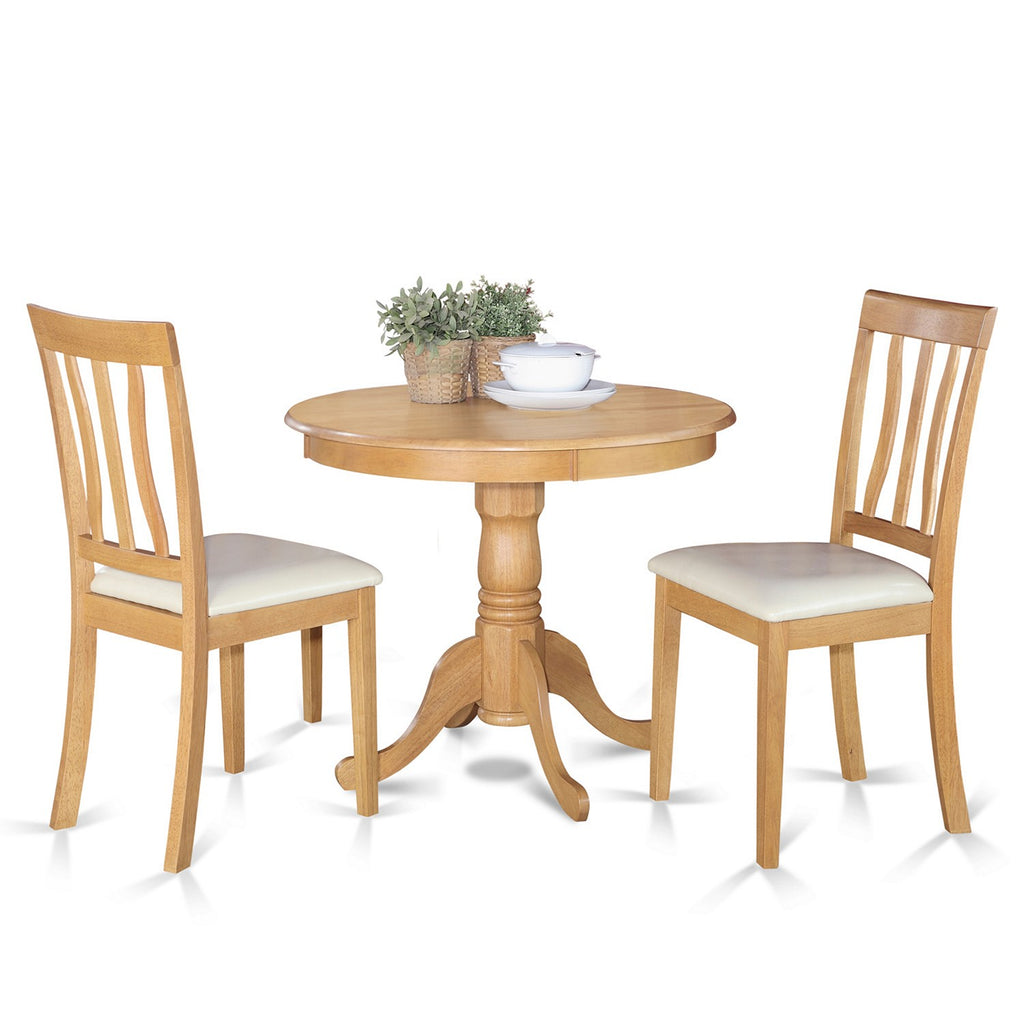 East West Furniture ANTI3-OAK-LC 3 Piece Kitchen Table Set for Small Spaces Contains a Round Dining Room Table with Pedestal and 2 Faux Leather Upholstered Chairs