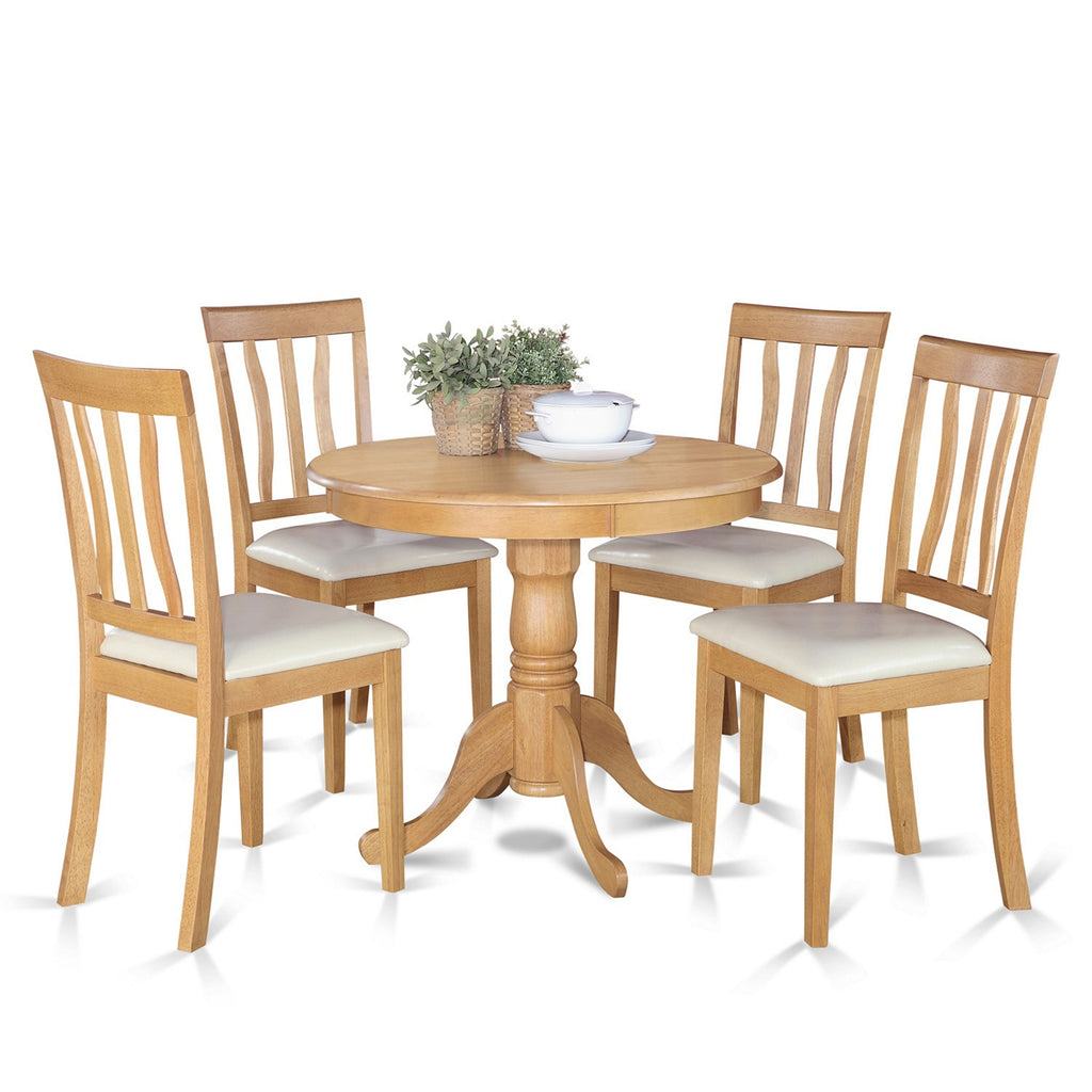 East West Furniture ANTI5-OAK-LC 5 Piece Dining Room Furniture Set Includes a Round Kitchen Table with Pedestal and 4 Faux Leather Upholstered Dining Chairs