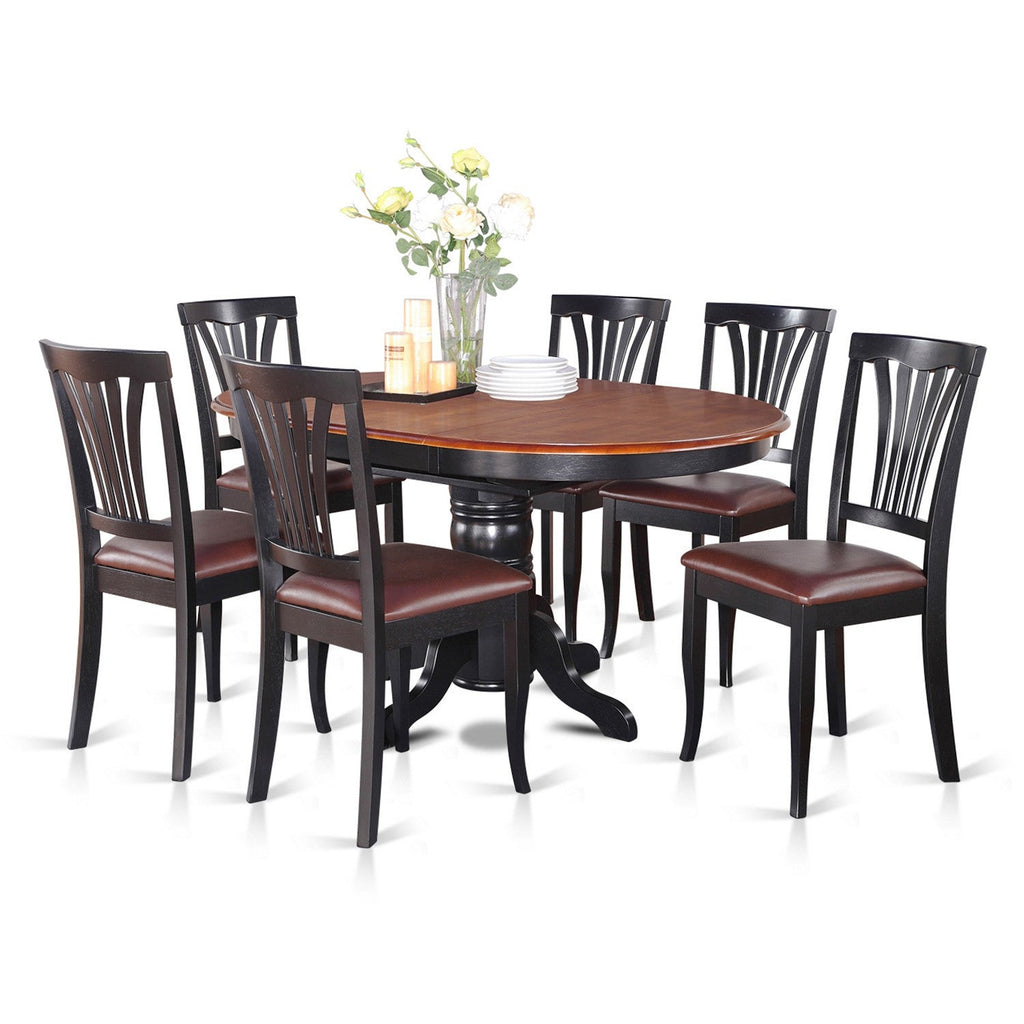 Juego de mesa de comedor de 7 piezas East West Furniture AVON7-BLK-LC. Incluye una mesa de comedor ovalada con hojas de mariposa y 6 sillas tapizadas en piel sintética.