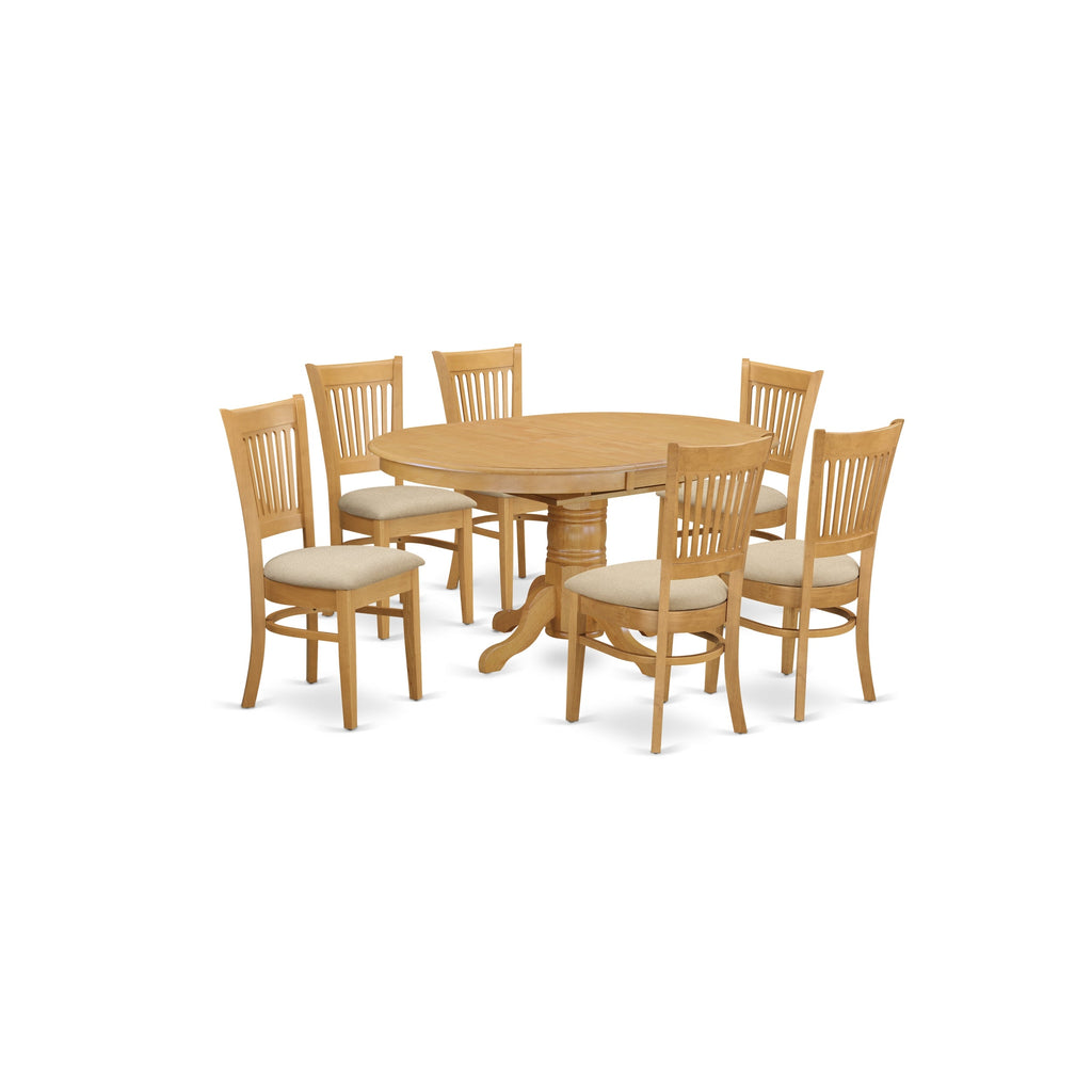 Juego de mesa de comedor de 7 piezas East West Furniture AVVA7-OAK-C. Incluye una mesa de comedor ovalada con hojas de mariposa y 6 sillas tapizadas en tela de lino.