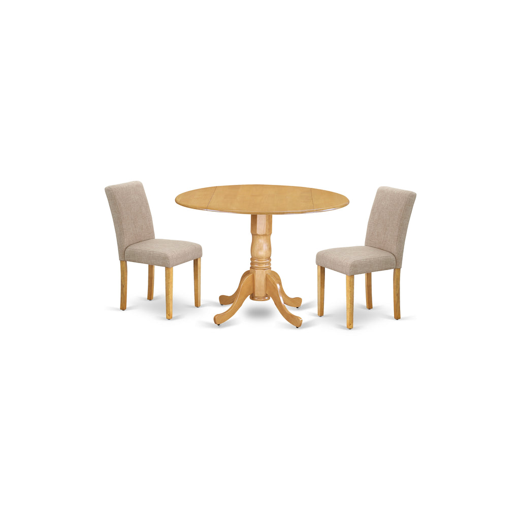 East West Furniture DLAB3-OAK-04 3 Piece Dining Room Furniture Set Contains a Round Dining Table with Dropleaf and 2 Light Tan Linen Fabric Parsons Chairs
