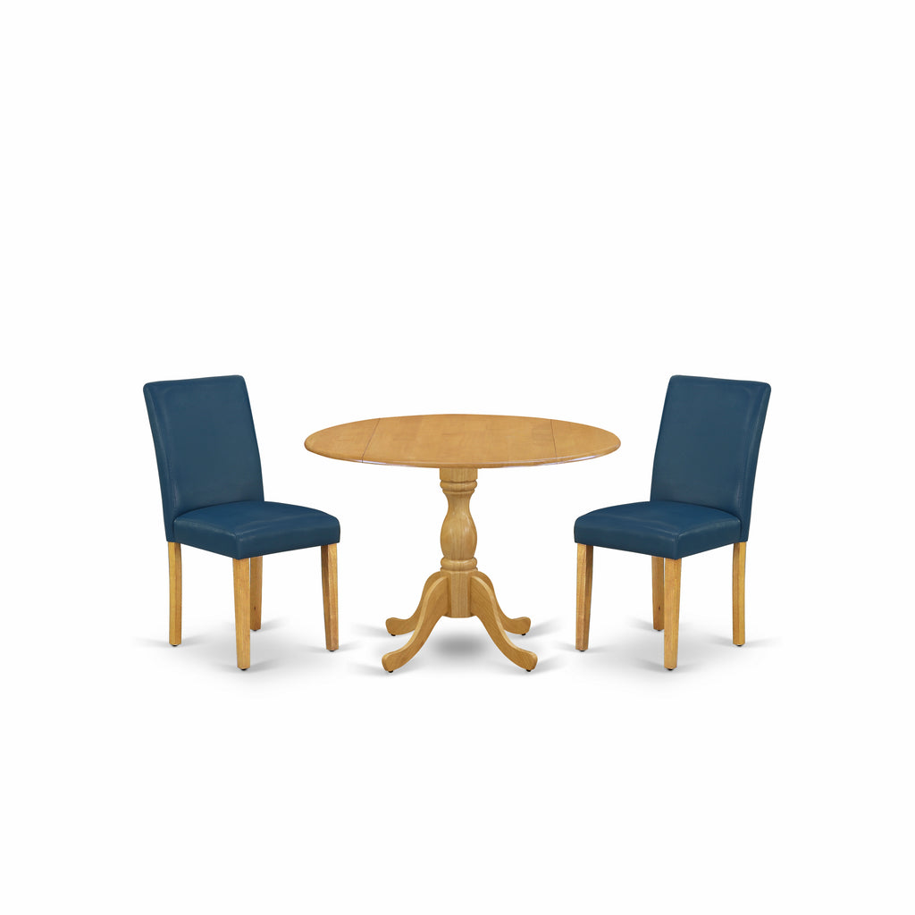 East West Furniture DMAB3-OAK-55 3 Piece Dining Table Set Contains a Round Dining Room Table with Dropleaf and 2 Oasis Blue Faux Leather Parsons Chairs