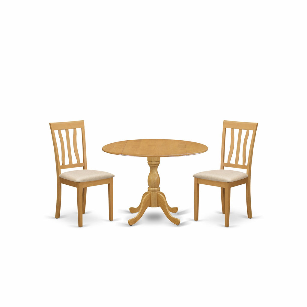 Juego de mesa de cocina de 3 piezas East West Furniture DMAN3-OAK-C para espacios pequeños. Incluye una mesa de comedor redonda con alas abatibles y 2 sillas tapizadas en tela de lino.