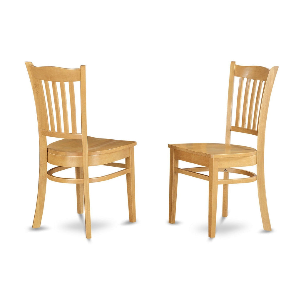 Juego de mesa de comedor East West Furniture VAGR7-OAK-W de 7 piezas compuesto por una mesa ovalada de madera con hojas de mariposa y 6 sillas de comedor de cocina.