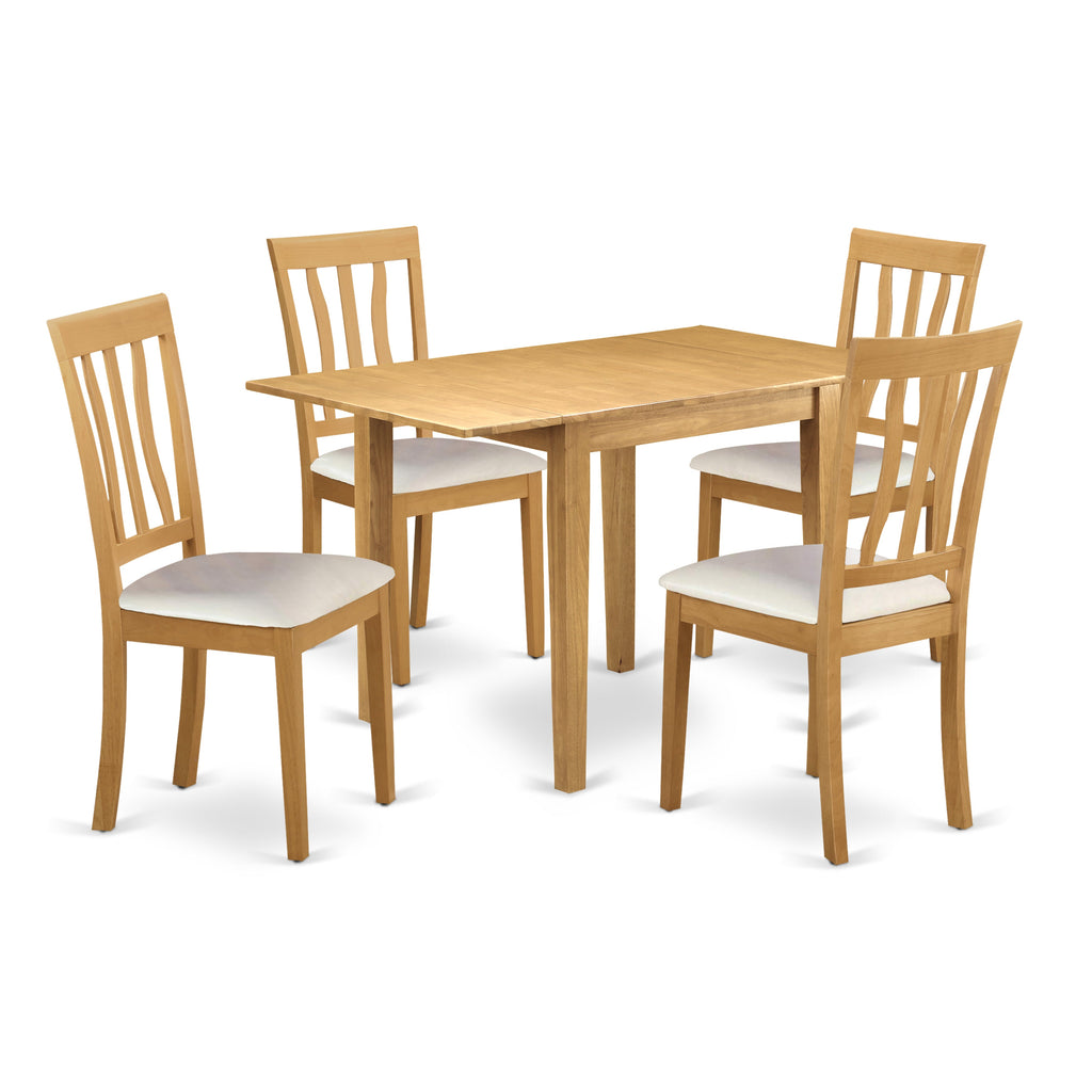 El juego de comedor de 5 piezas NDAN5-OAK-LC de East West Furniture incluye una mesa de comedor rectangular con alas abatibles y 4 sillas de cocina tapizadas en piel sintética.