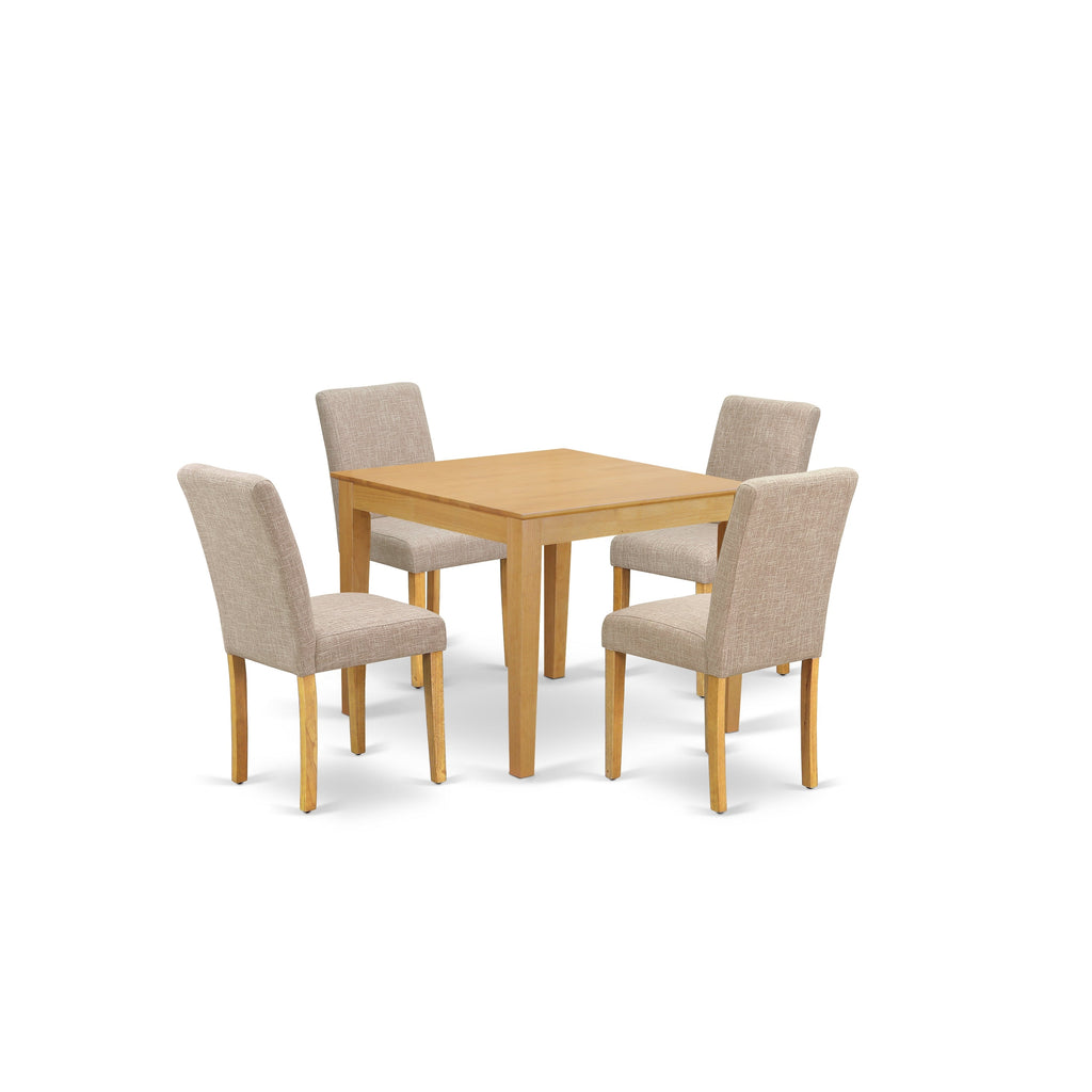 Juego de mesa de comedor de 5 piezas East West Furniture OXAB5-OAK-04 para 4 personas. Incluye una mesa de cocina cuadrada y 4 sillas de comedor Parsons de tela de lino color tostado claro.