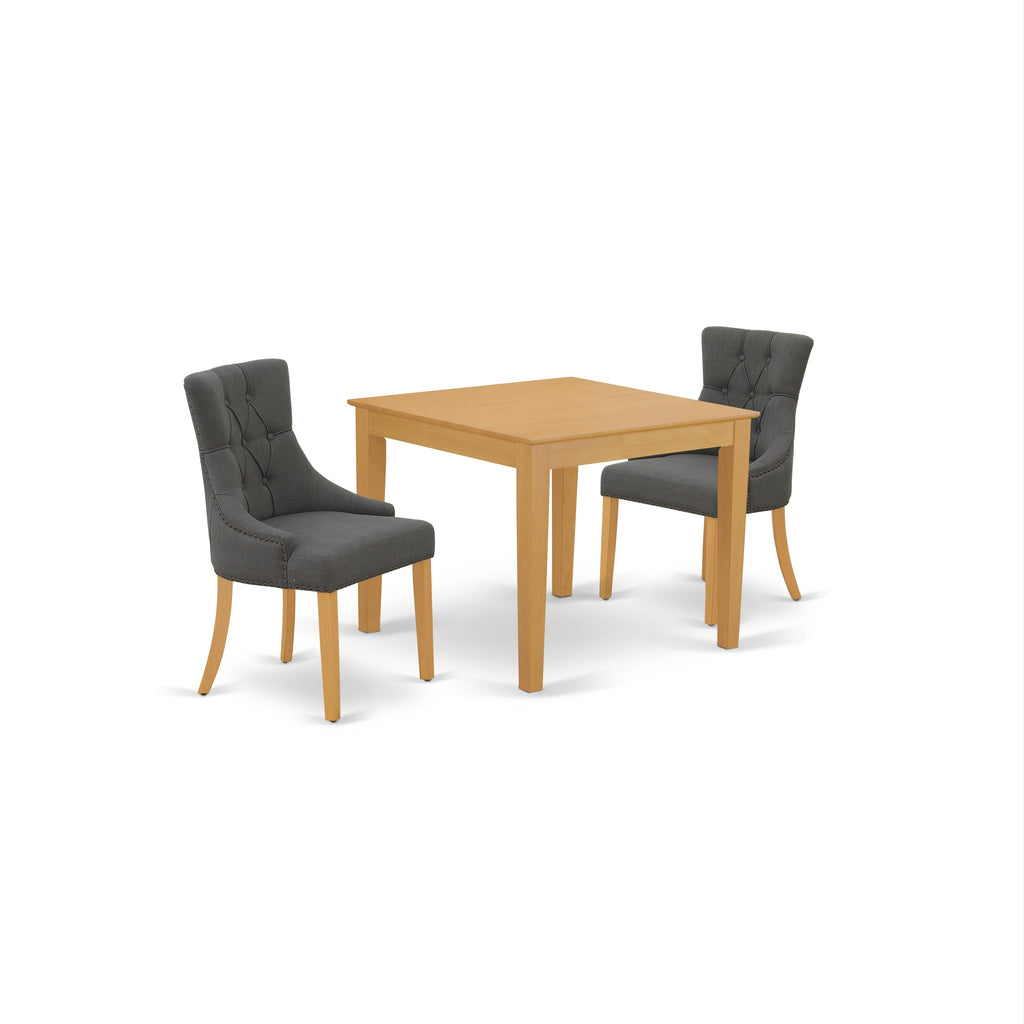 Juego de mesa de comedor de 3 piezas East West Furniture OXFR3-OAK-20 para espacios pequeños. Contiene una mesa de comedor cuadrada y 2 sillas tapizadas en tela de lino Gotham oscuro.