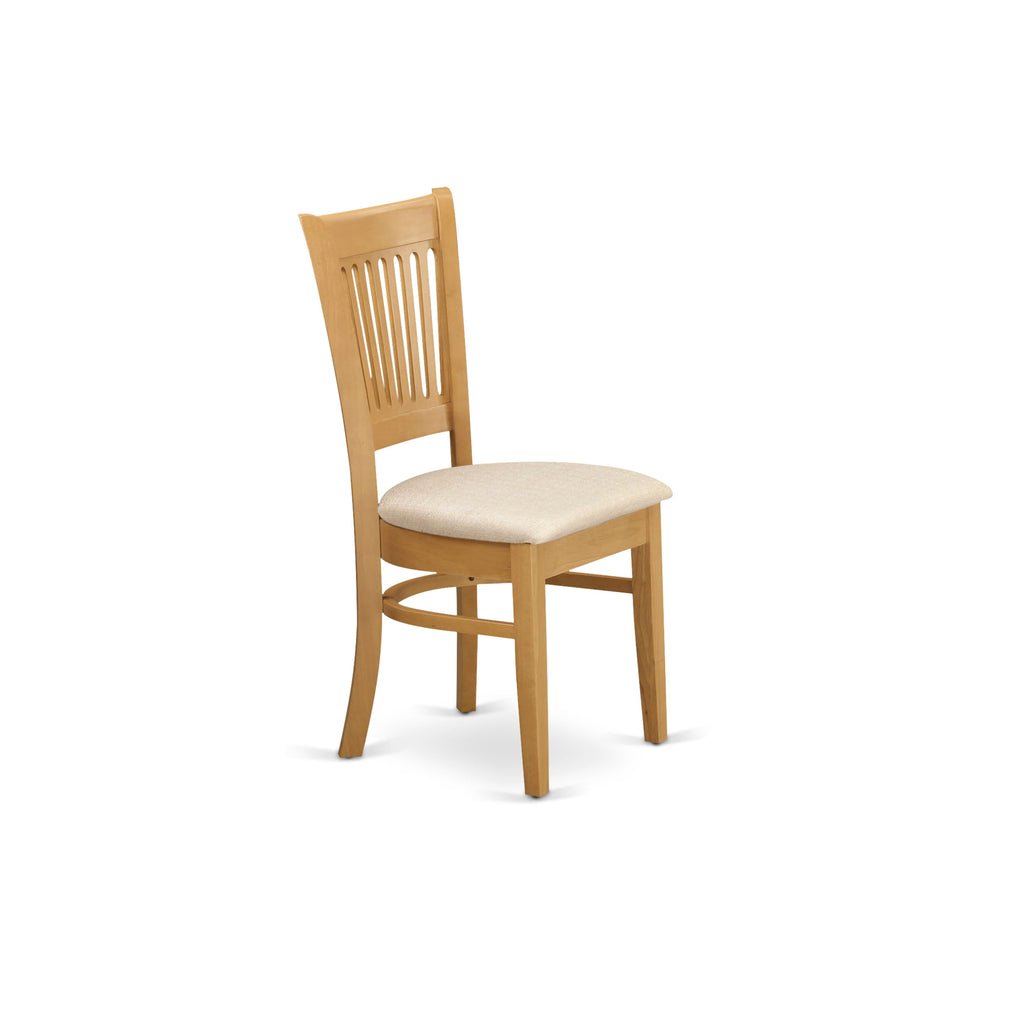 El juego de mesa de comedor moderno de 5 piezas East West Furniture AVVA5-OAK-C incluye una mesa ovalada de madera con hojas de mariposa y 4 sillas de comedor de cocina de tela de lino.