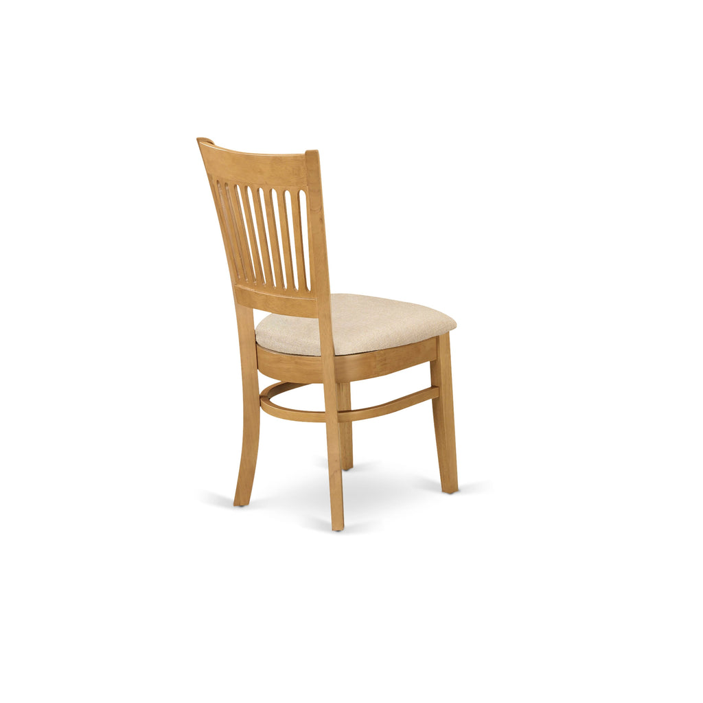 El juego de mesa de comedor moderno de 5 piezas East West Furniture AVVA5-OAK-C incluye una mesa ovalada de madera con hojas de mariposa y 4 sillas de comedor de cocina de tela de lino.