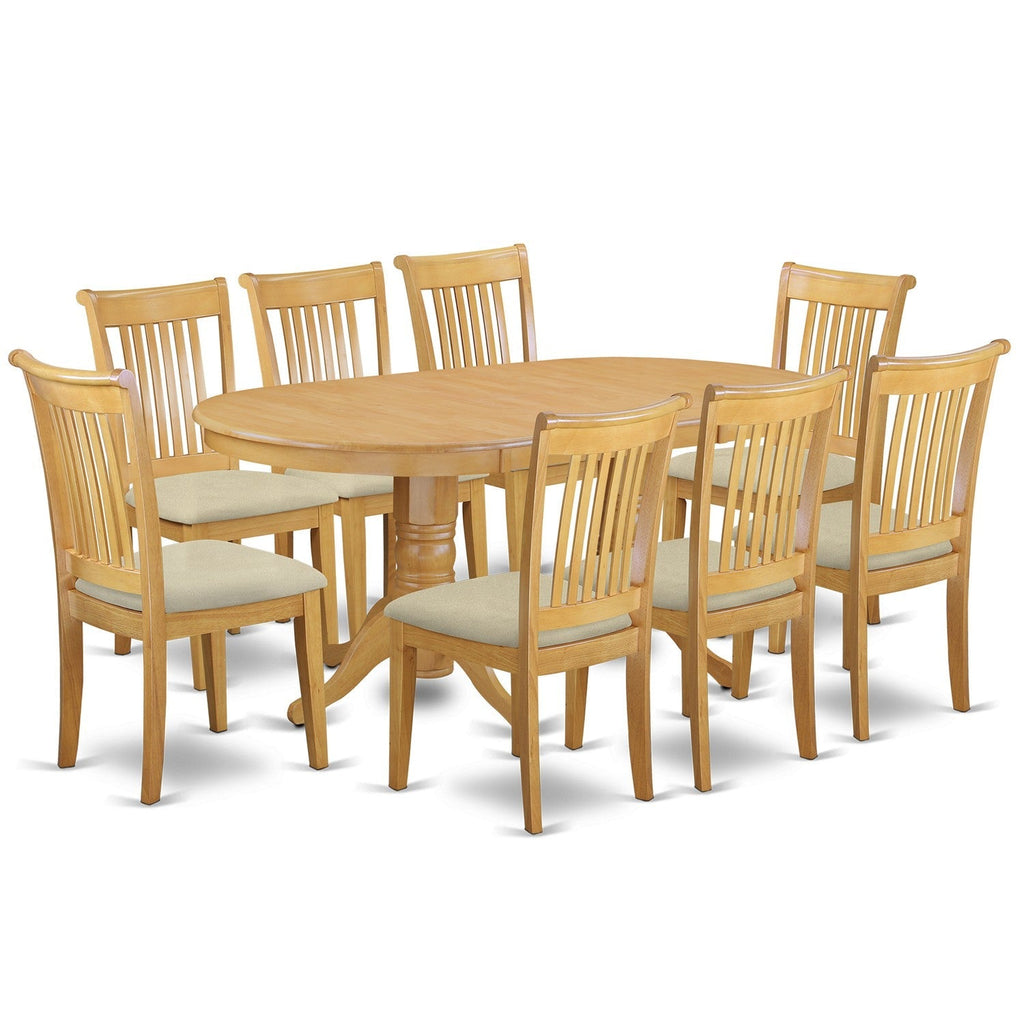 El juego de mesa de comedor East West Furniture VAPO9-OAK-C de 9 piezas incluye una mesa ovalada de madera con hojas de mariposa y 8 sillas de comedor de tela de lino.